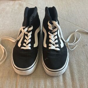 Black and White High-Top Vans Sneakers